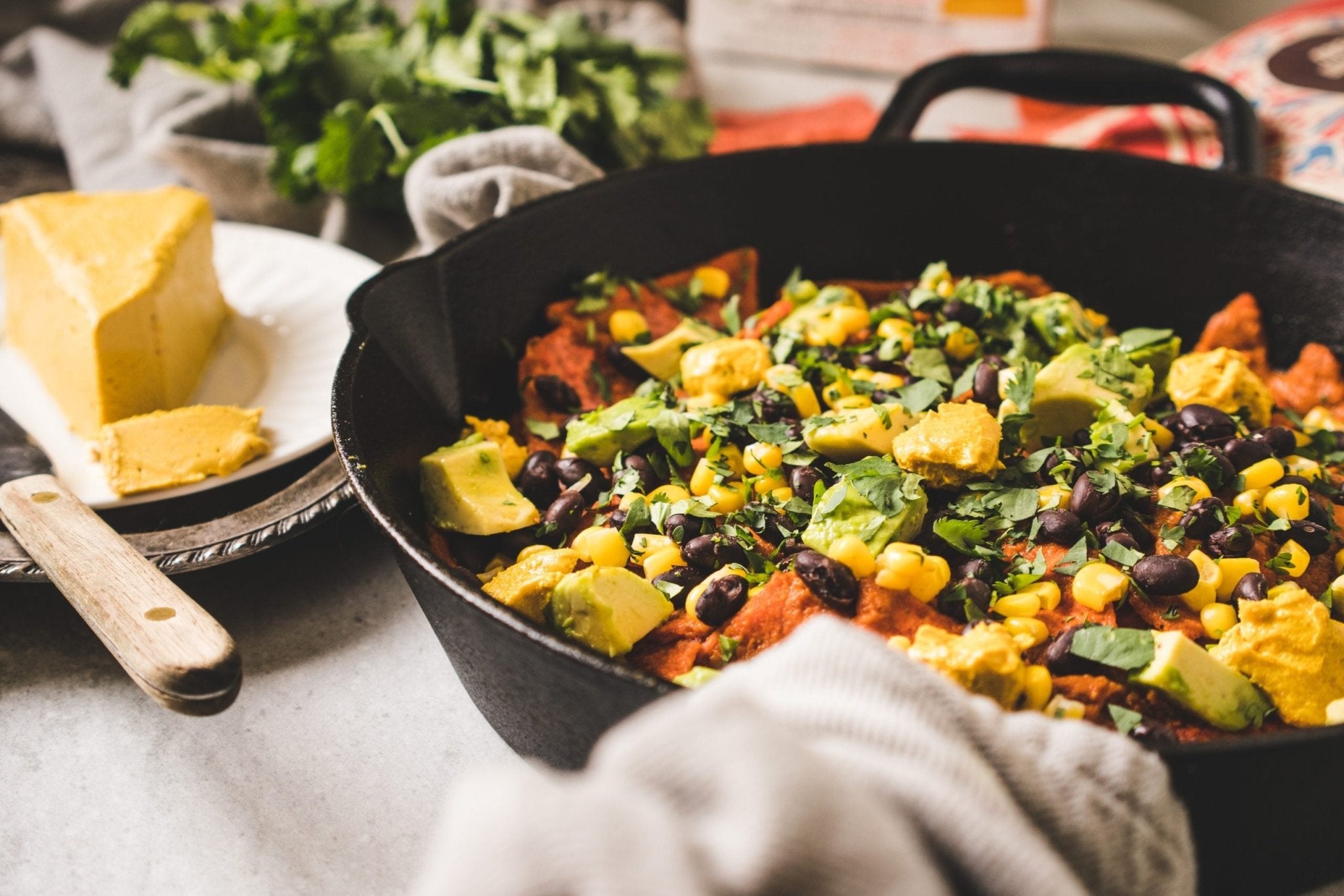 Smoky Red Chilaquiles with Black Beans & Avocado